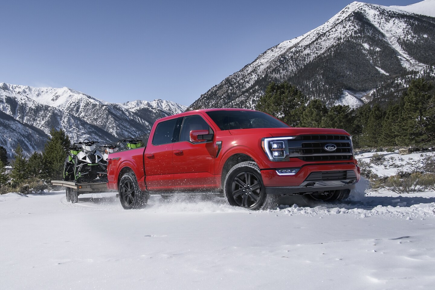 2023 Ford F-150 SuperCrew Cab in Red in the snow